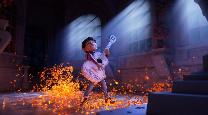 Coco's lead character, Miguel, playing the guitar.